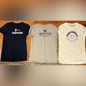 Aeropostale 3 shirts , Navy, Grey Graphic and White Floral Embroidered Tee
